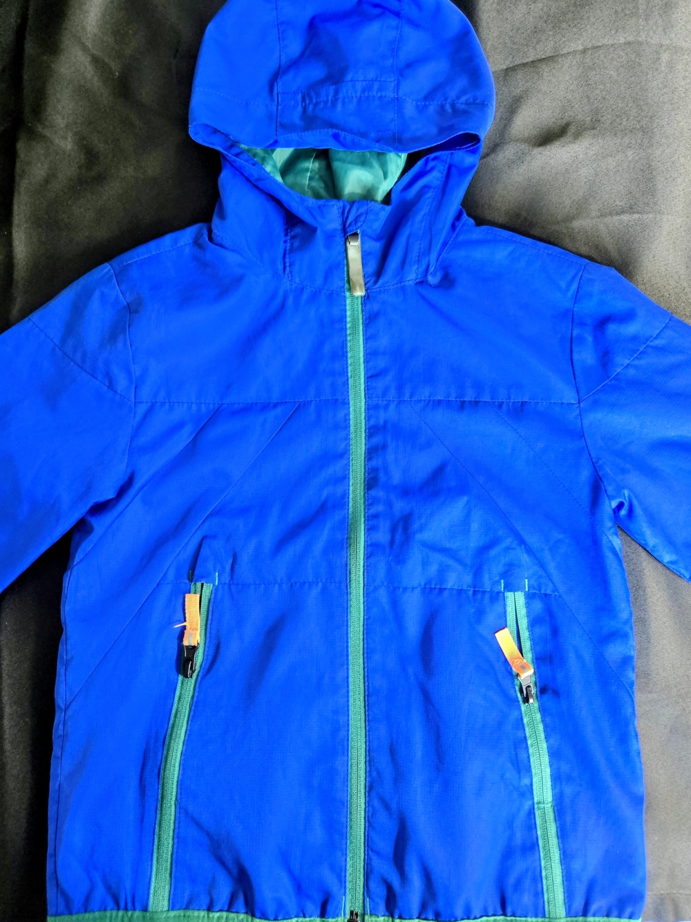 Champion Bright Blue Hooded Raincoat with Green Zippers